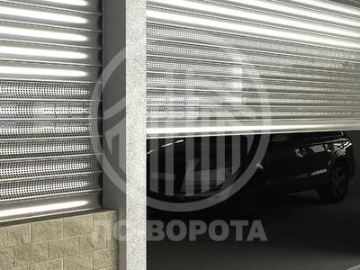 Стальные рулонные ворота с перфорированной сеткой